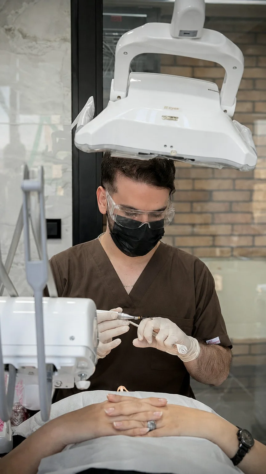 Dr. Pedram Amiri in a dental clinical setting